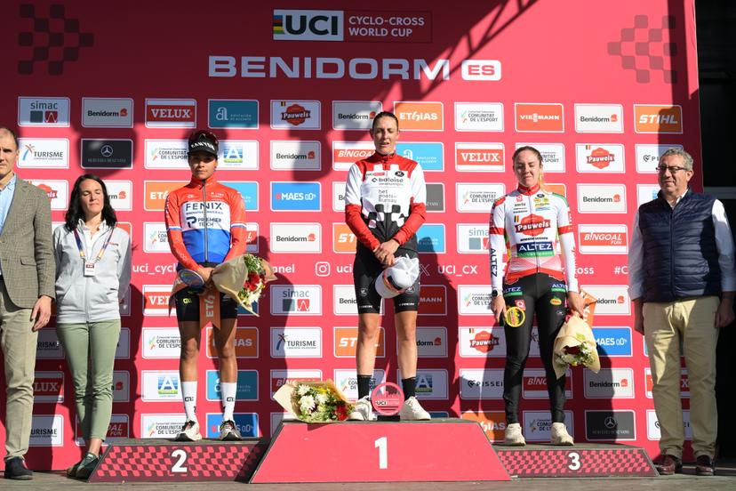 Dutch Ceylin Del Carmen Alvarado, Dutch Lucinda Brand and French Amandine Fouquenet celebrate on the podium after the women's Elite race at the cyclocross cycling event in Benidorm, Spain, Sunday 18 January 2026, stage 10/12 in the UCI World Cup competition. BELGA PHOTO DAVID PINTENS