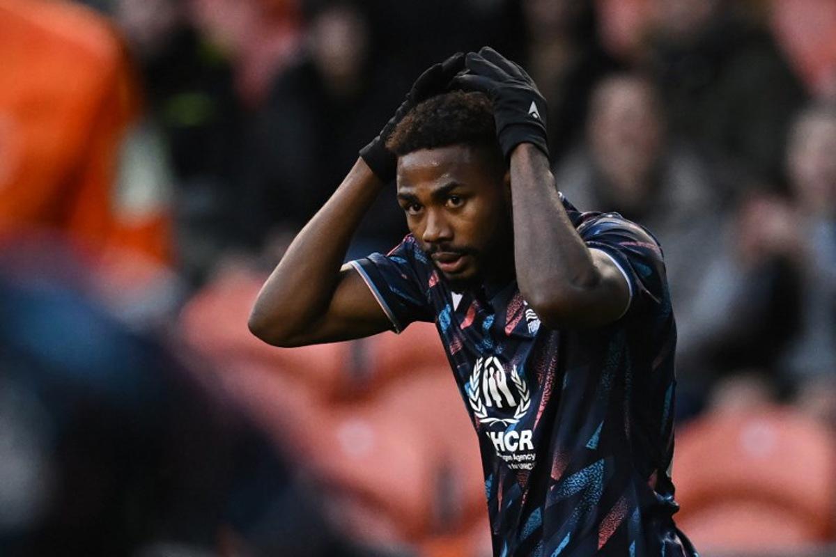 Nottingham Forest's Nigerian striker Emmanuel Dennis reacts to a missed chance during the English FA Cup third round football match between Blackpool and Nottingham Forest at Bloomfield Road in Blackpool, north-west England on January 7, 2023. Blackpool won the game 4-1. Paul ELLIS / AFP