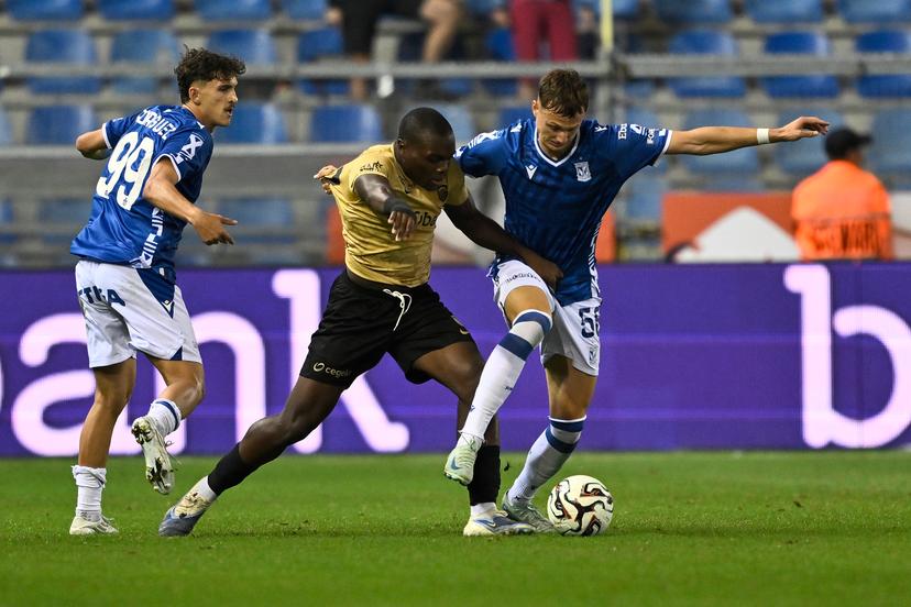 Genk's Ken Nkuba and Lech Poznan's Kornel Lisman fight for the ball during a soccer match between Belgian soccer team KRC Genk and Polish team KKS Lech Poznan, in Genk on Thursday 28 August 2025, the return leg in the play-offs of the UEFA Europa League competition. Genk won the first leg 1-5. BELGA PHOTO JOHAN EYCKENS