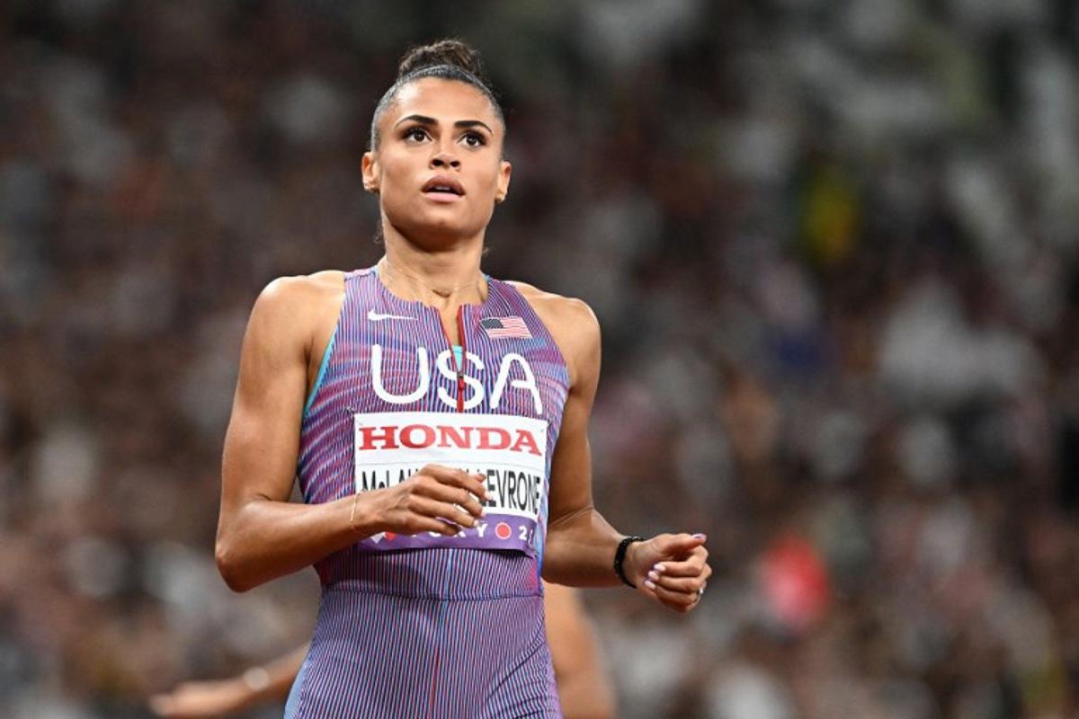 US' Sydney McLaughlin-Levrone reacts after crossing the finish line in the women's 400m semi-final during the World Athletics Championships in Tokyo on September 16, 2025.  Jewel SAMAD / AFP