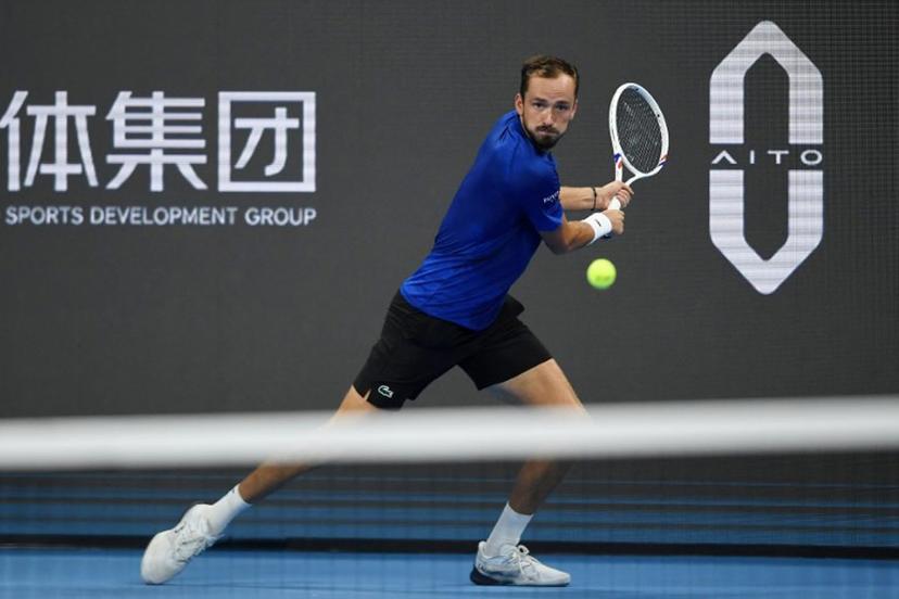 Russia's Daniil Medvedev hits a return to Hong Kong's Coleman Wong during their men's singles quarter-final match at the Hangzhou Open tennis tournament in Hangzhou, in China's eastern Zhejiang province on September 27, 2026.  STR / AFP