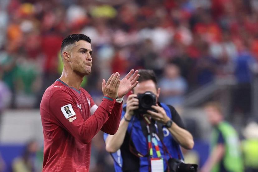 Portugal's forward #07 Cristiano Ronaldo greets fans after losing the 2026 World Cup round of 16 football match between Portugal and Spain at the Dallas Stadium in Arlington on July 6, 2026.  Thomas COEX / AFP