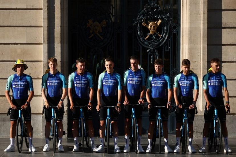 (From L) Decathlon AG2R La Mondial Team's Swiss rider Stefan Bissegger, Decathlon AG2R La Mondial Team's Australian rider Callum Scotson, Decathlon AG2R La Mondial Team's Belgian rider Oliver Naesen, Decathlon AG2R La Mondial Team's French rider Clement Berthet, Decathlon AG2R La Mondial Team's French rider Bruno Armirail, Decathlon AG2R La Mondial Team's Austrian rider Felix Gall, Decathlon AG2R La Mondial Team's French rider Aurelien Paret-Peintre and Decathlon AG2R La Mondial Team's French rider Bastien Tronchon pose during the official teams presentation days prior to the start of the 112th edition of the Tour de France cycling race, in Lille, northern France, on July 3, 2025.  Anne-Christine POUJOULAT / AFP