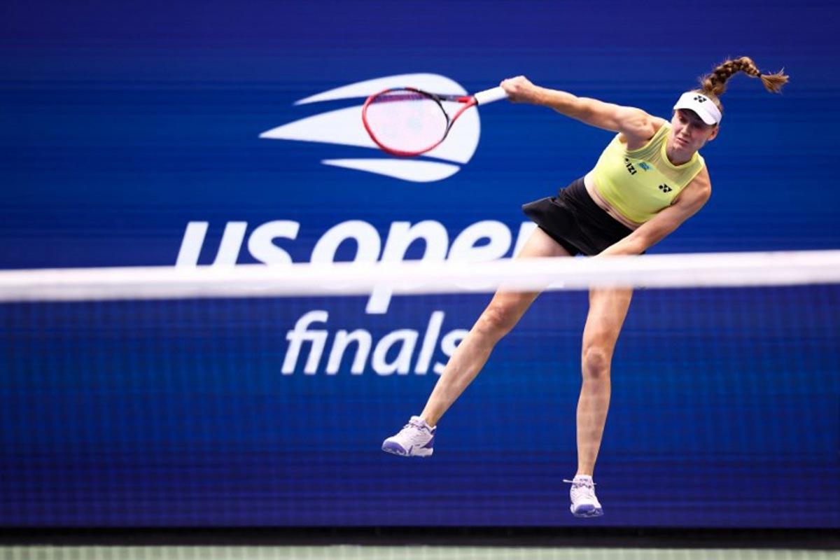 Kazakhstan's Elena Rybakina serves against Belarus's Aryna Sabalenka during the women's singles final tennis match on day fourteen of the US Open tennis tournament at the USTA Billie Jean King National Tennis Center in New York City on September 12, 2026.  CHARLY TRIBALLEAU / AFP