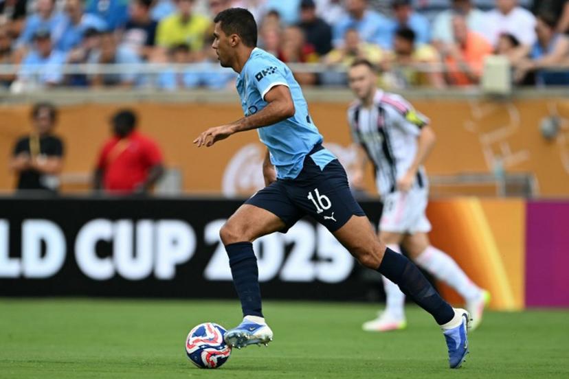 Manchester City's Spanish midfielder #16 Rodri runs with the ball during the FIFA Club World Cup 2025 Group D football match between Italy's Juventus and England's Manchester City at the Camping World stadium in Orlando on June 26, 2025.  Chandan KHANNA / AFP