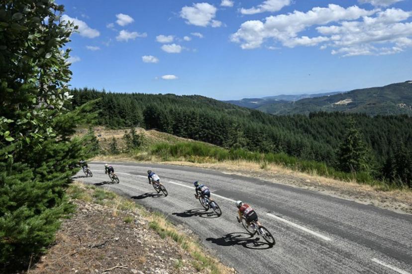 Riders compete during the 6th (out of 9) stage of the fifth edition of the Women's Tour de France cycling race, 153.4 km from Montbrison to Tournon-sur-Rhone, in central-eastern France on August 6, 2026.  NICOLAS TUCAT / AFP
