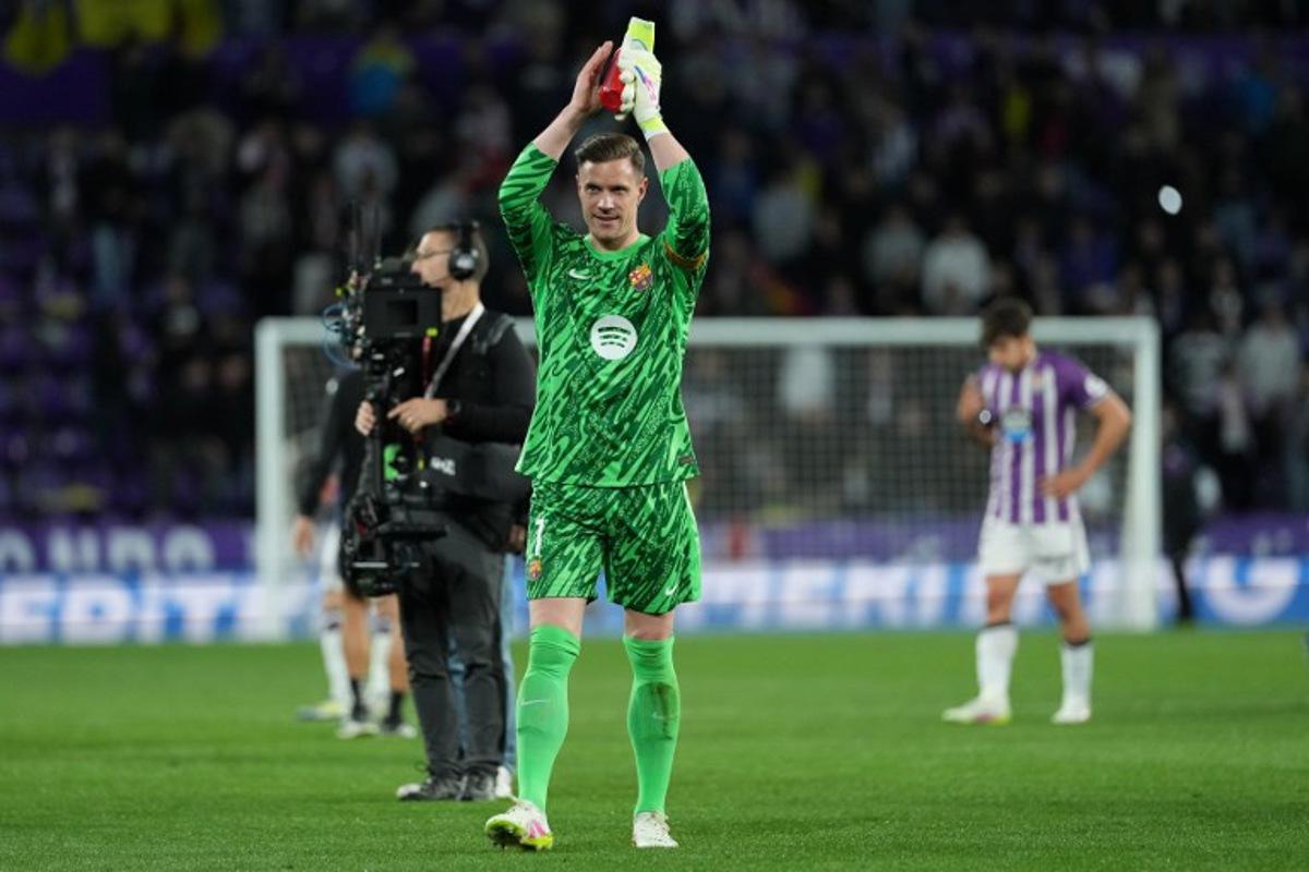 Barcelona's German goalkeeper #01 Marc-Andre Ter Stegen celebrates at the end of the Spanish league football match between Real Valladolid FC and FC Barcelona at the Jose Zorrilla stadium in Valladolid on May 3, 2025.  Cesar Manso / AFP