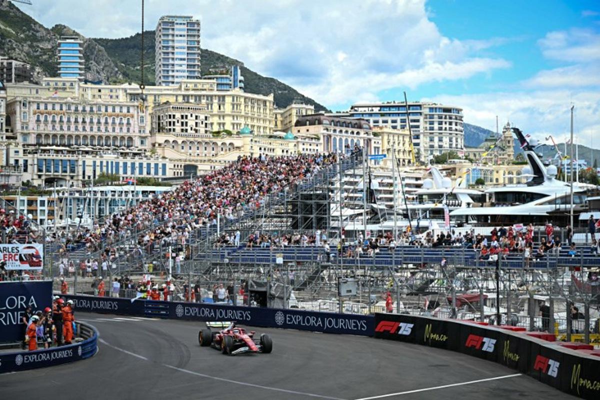 Ferrari's Monegasque driver Charles Leclerc drives with a damaged front wing during the first practice session for the Formula One Monaco Grand Prix at the Circuit de Monaco, on May 23, 2025, two days ahead of the race.    Gabriel BOUYS / AFP