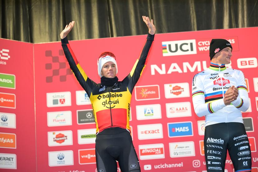 Belgian Thibau Nys and Dutch Mathieu Van Der Poel pictured on the podium after the men's elite race of the Cyclocross World Cup, in Namur, Sunday 14 December 2025, stage 4 (out of 12) in the World Cup of the 2026-2027 season. BELGA PHOTO DAVID PINTENS