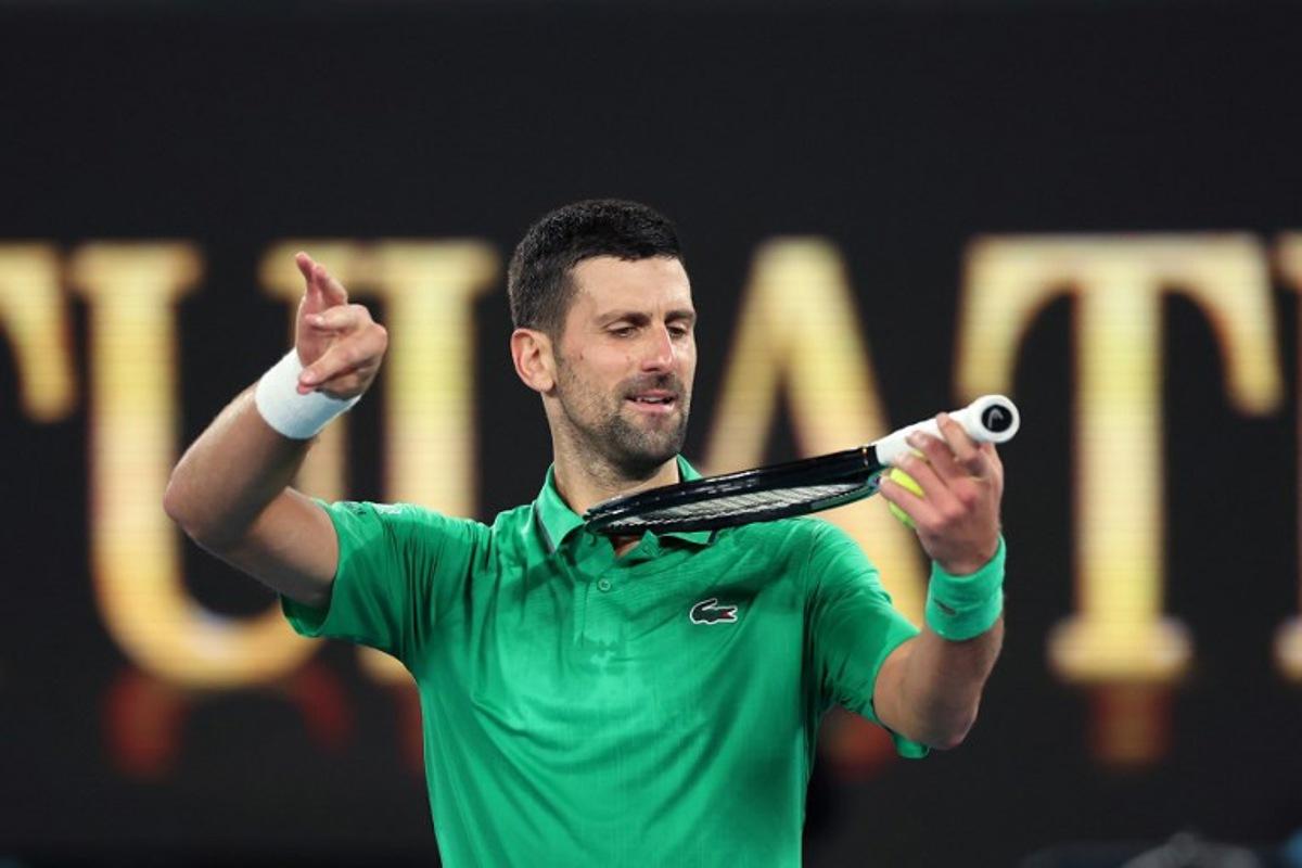 Serbia's Novak Djokovic celebrates victory over Netherlands' Botic van de Zandschulp after their men's singles match on day seven of the Australian Open tennis tournament in Melbourne on January 24, 2026.  Martin KEEP / AFP