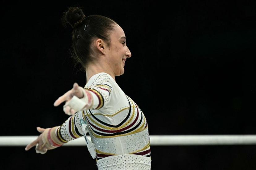 Belgium's Nina Derwael reacts after competing in the artistic gymnastics women's uneven bars final during the Paris 2024 Olympic Games at the Bercy Arena in Paris, on August 4, 2024.  Lionel BONAVENTURE / AFP