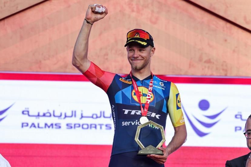 Jonathan Lidl-Trek's Italian rider Jonathan Milan reacts on the podium after winning the fourth stage of the UAE Tour cycling event in al-Fujairah on February 19, 2026.  Fadel SENNA / AFP