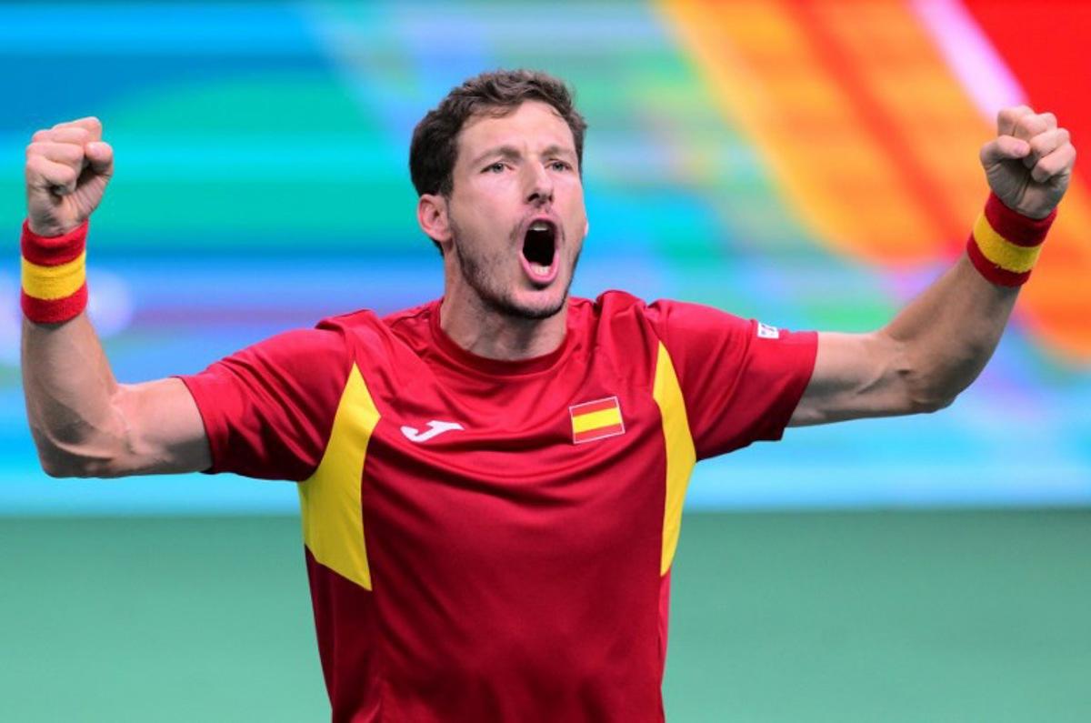 Spain's Pablo Carreno Busta celebrates after winning against Germany's Jan-Lennard Struff after their 2025 Davis Cup semi-final single tennis match at the Super Tennis Arena in Bologna, northen Italy, on November 22, 2025.  Tiziana FABI / AFP