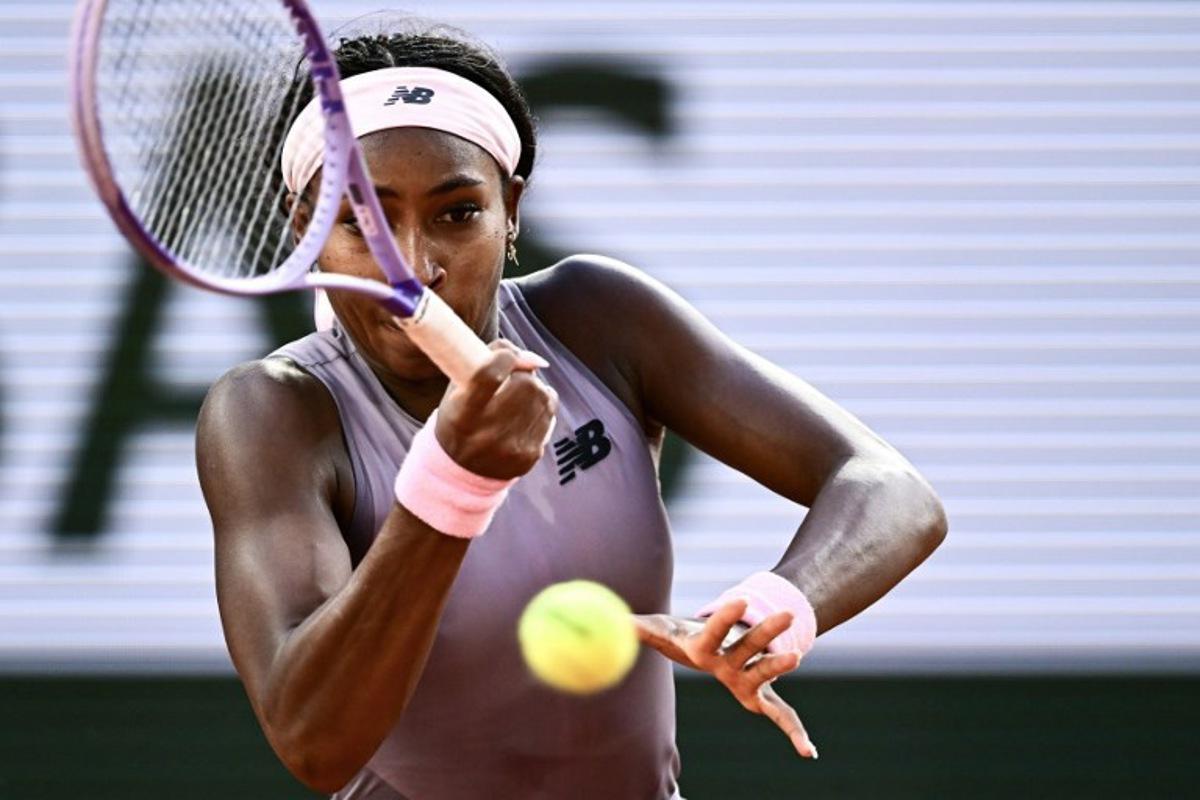 US Coco Gauff plays a forehand return to Austria's Anastasia Potapova during their women's singles match on day 7 of the French Open tennis tournament on Court Philippe-Chatrier at the Roland-Garros Complex in Paris on May 30, 2026.  JULIEN DE ROSA / AFP