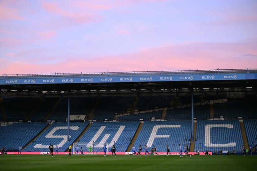 Empty seats due to a protest against Sheffield Wednesday's Thai owner Dejphon Chansiri, are seen during the English League Cup second round football match between Sheffield Wednesday and Leeds United at The Hillsborough Stadium in Sheffield, northern England on August 26, 2025.  Oli SCARFF / AFP