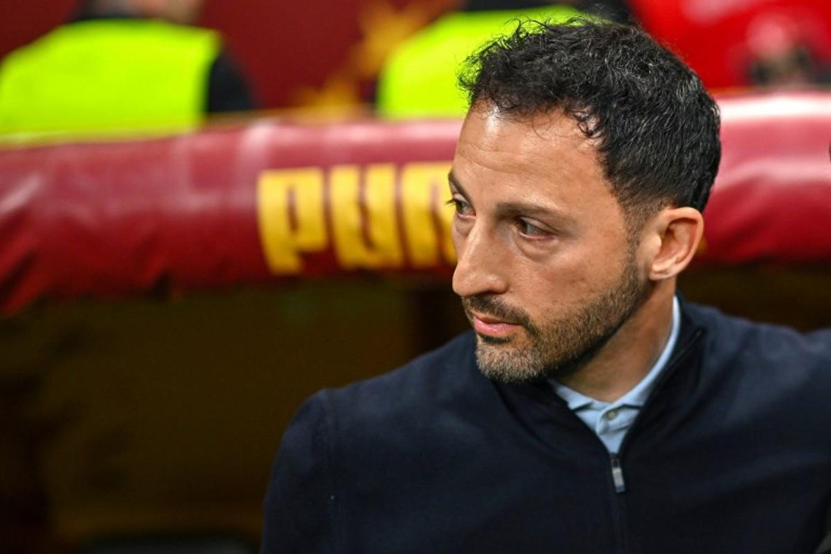 Fenerbahce's Italian head coach Domenico Tedesco looks on from the technical area during the Turkish Super lig football match between Fenerbahce and Galatasaray at the Rams Park Stadium in Istanbul, on April 26, 2026. Turkish club Fenerbahçe sacked their coach, the Italian-German Domenico Tedesco, on April 27, 2026, a day after a disastrous 3-0 derby defeat in the league against league leaders Galatasaray, a loss that crushed their last hopes of a title. "We have parted ways with our coach Domenico Tedesco," Fenerbahçe wrote in a statement. The club trails their arch-rivals Galatasaray by seven points with three matches remaining in the season. Yasin AKGUL / AFP