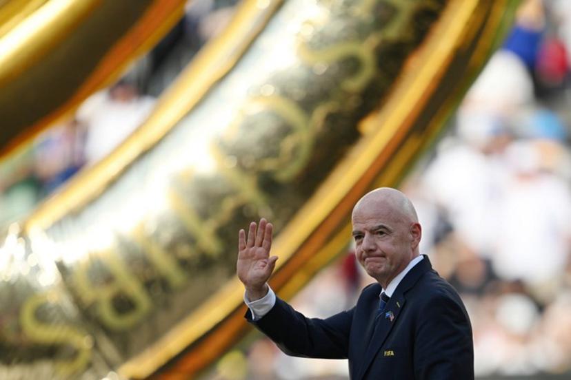 FIFA President Gianni Infantino waves during the award ceremony for the FIFA Club World Cup 2025 Champions, following the final football match between England's Chelsea and France's Paris Saint-Germain at the MetLife Stadium in East Rutherford, New Jersey on July 13, 2025.  ANGELA WEISS / AFP