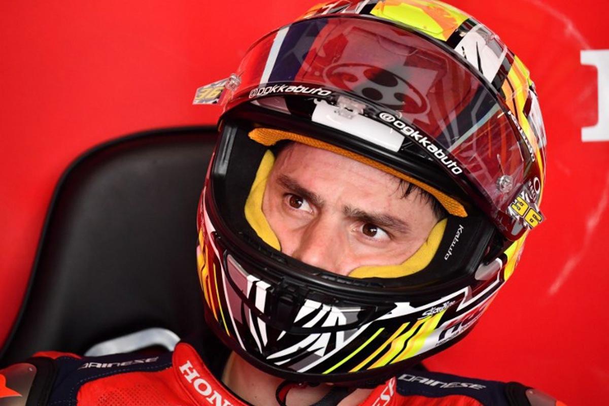 Team Repsol Honda Team's Joan Mir takes a break during the Practice session at the Balaton Park Circuit in Balatonfokajar, Hungary, on June 5, 2026, ahead of the Hungarian Motorcycle MotoGP Grand Prix.   FERENC ISZA / AFP