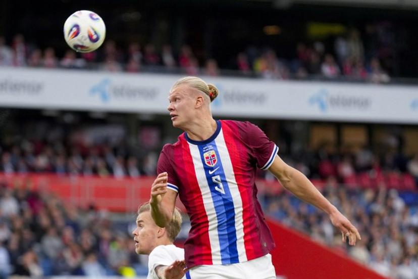 Norway's forward #09 Erling Braut Haaland heads a ball during the International Friendly football match between Norway and Finland, in Oslo on September 4, 2025.  Fredrik Varfjell / NTB / AFP