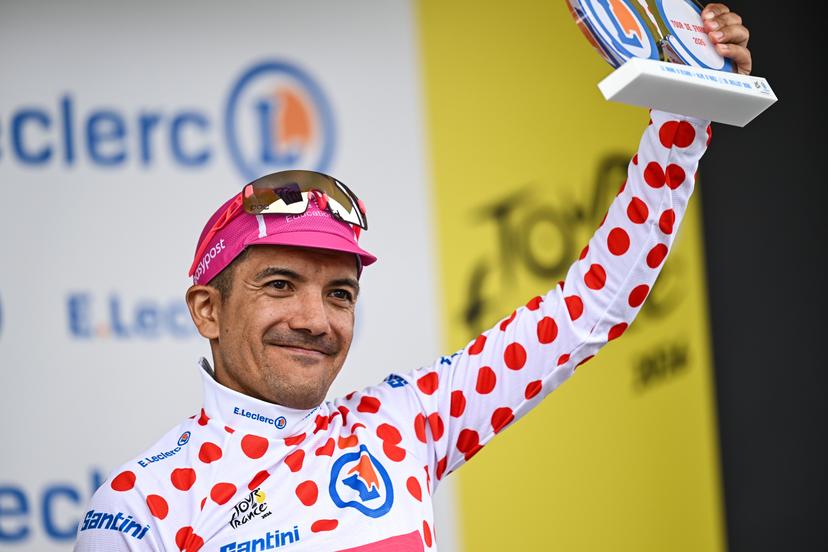 Ecuadorian Richard Carapaz of EF Education-EasyPost celebrates on the podium in the red polka-dot jersey for best climber after stage 20 of the 2026 Tour de France cycling race, a stage of 171km Le Bourg d'Oisans to Alpe d'Huez, on Saturday 25 July 2026. The 113th edition of the Tour de France starts on Saturday 4 July in Barcelona, Spain, and will finish in Paris, France on the 26th of July. BELGA PHOTO DAVID PINTENS
