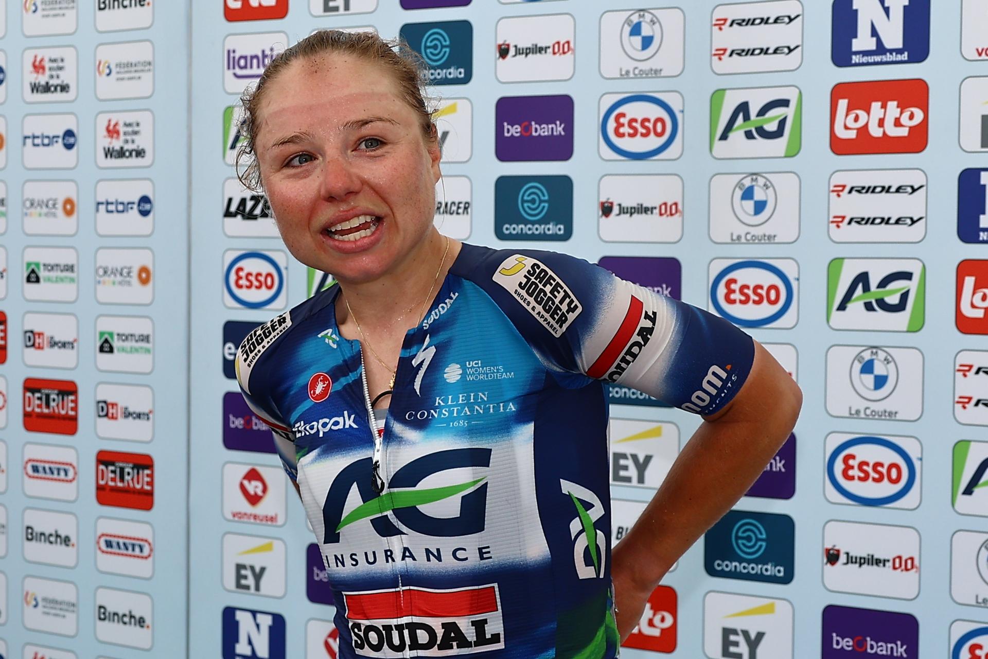 Belgian Justine Ghekiere celebrates after winning the women's elite road race of the Belgian Cycling Championships, 132,8 km from and to the Grand Place square in Binche on Sunday 29 June 2025. BELGA PHOTO DAVID PINTENS