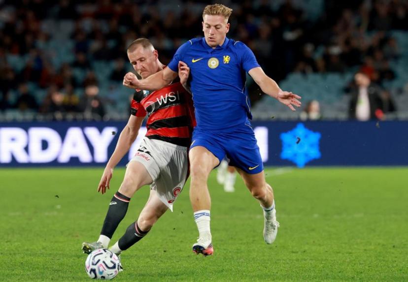 Chelsea's Liam Delap (R) is tackled by Wanderers's Anthony Pantazopoulos (L) during the Sydney Super Cup football match between Chelsea FC and the Western Sydney Wanderers at Stadium Australia in Sydney on July 28, 2026.  DAVID GRAY / AFP