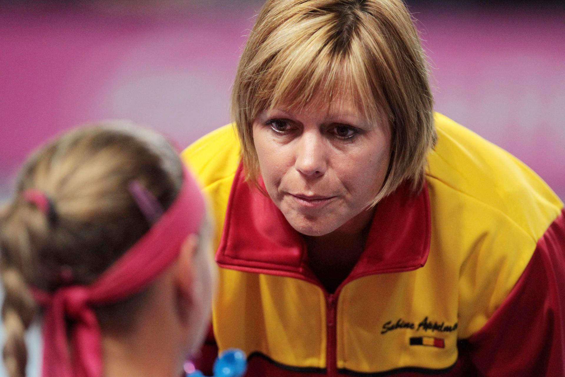 20110417 - CHARLEROI, BELGIUM: Belgian captain Sabine Appelmans talks with Belgian Yanina Wickmayer (WTA 23) during the match between Wickmayer and Kvitova, at the Fed Cup meeting between Belgium and the Czech Republic, in Charleroi, Sunday 17 April 2011. Belgium and the Czech Republic play in the semifinal of the world group this week-end. BELGA PHOTO VIRGINIE LEFOUR