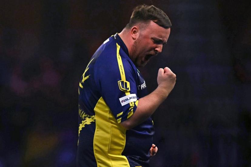England's Luke Littler celebrates winning the fourth set against Netherlands' Michael van Gerwen during the PDC World Darts Championship final, at Alexandra Palace in London on January 3, 2025.  Ben STANSALL / AFP