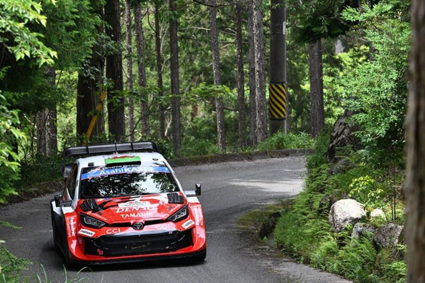 Elfyn Evans of Britain and his co-driver Scott Martin of Britain drive their Toyota GR Yaris Rally1 during the SS19 Nukata section of the Rally Japan, the 7th round of  FIA World Rally Championships, in Shinshiro city, Aichi prefecture on May 31, 2026.  Toshifumi KITAMURA / AFP