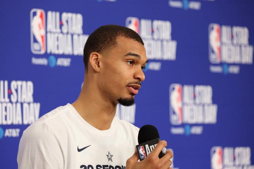 French basketball player Victor Wembanyama of the San Antonio Spurs speaks to the media during the NBA All-Star media day at the Intuit Dome in Inglewood, California, on February 14, 2026.  Patrick T. Fallon / AFP