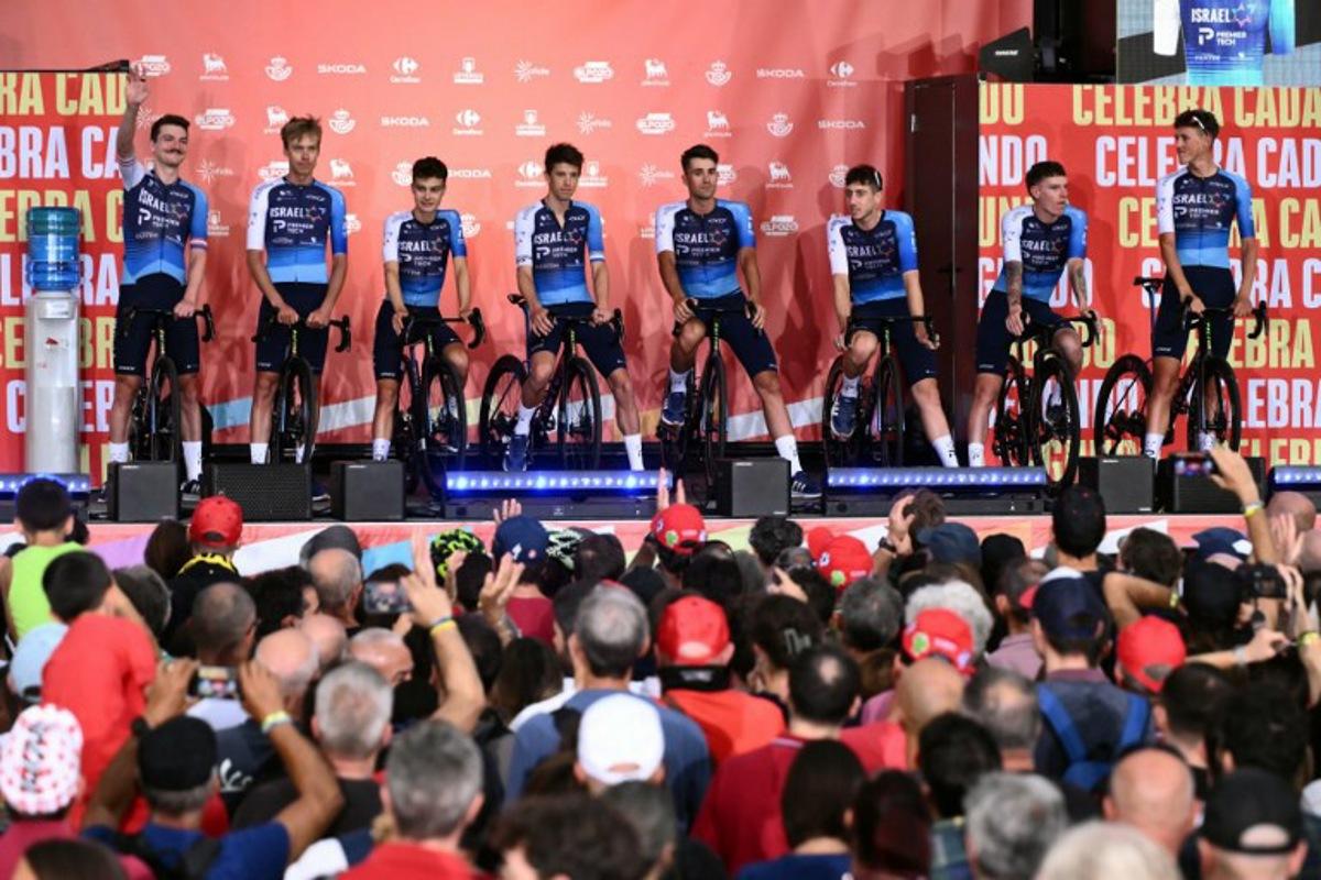 Team Israel-Premier Tech is seen during the official teams presentation of the 80th edition of 'La Vuelta' cycling tour of Spain, in Torino, Italy on August 21, 2025.  Marco BERTORELLO / AFP
