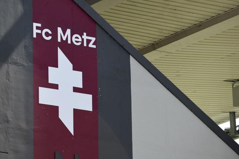 This photograph taken on August 8, 2021 shows the FC Metz new logo, displayed on the stadium before the start of the French L1 football match between FC Metz and Lille OSC at Stade Saint-Symphorien in Longeville-les-Metz, northern France.  JEAN-CHRISTOPHE VERHAEGEN / AFP