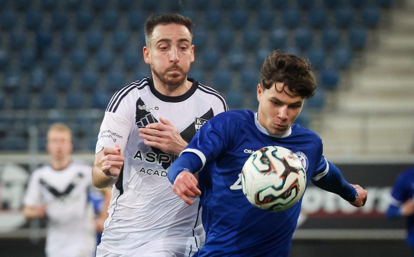 Eupen's Kevin Mohwald and Jong Gent's Ruslan Vydysh fight for the ball during a soccer game between Jong KAA Gent and KAS Eupen, Saturday 01 November 2025 in Gent, on day 12 of the 2025-2026 'Challenger Pro League' 1B second division of the Belgian championship. BELGA PHOTO VIRGINIE LEFOUR