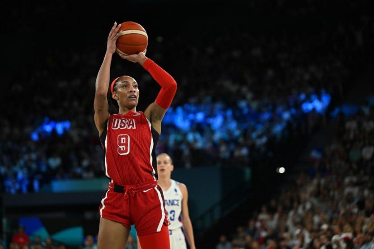 USA's #09 A'ja Wilson takes a free throw in the women's Gold Medal basketball match between France and the USA during the Paris 2024 Olympic Games at the Bercy  Arena in Paris on August 11, 2024.  Paul ELLIS / AFP