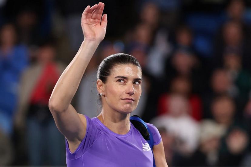 Romania's Sorana Cirstea waves to the crowd as she leaves the court following her second-round loss to Japan's Naomi Osaka on Day 5 of the 2026 Australian Open tennis tournament at in Melbourne on January 22, 2026.   Martin KEEP / AFP
