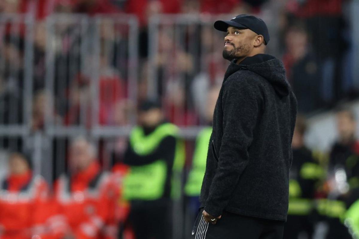 Bayern Munich's Belgian head coach Vincent Kompany follows the action from the sidelines during the German first division Bundesliga football match between FC Bayern Munich and Bayer Leverkusen in Munich, southern Germany on November 1, 2025.  Alexandra BEIER / AFP