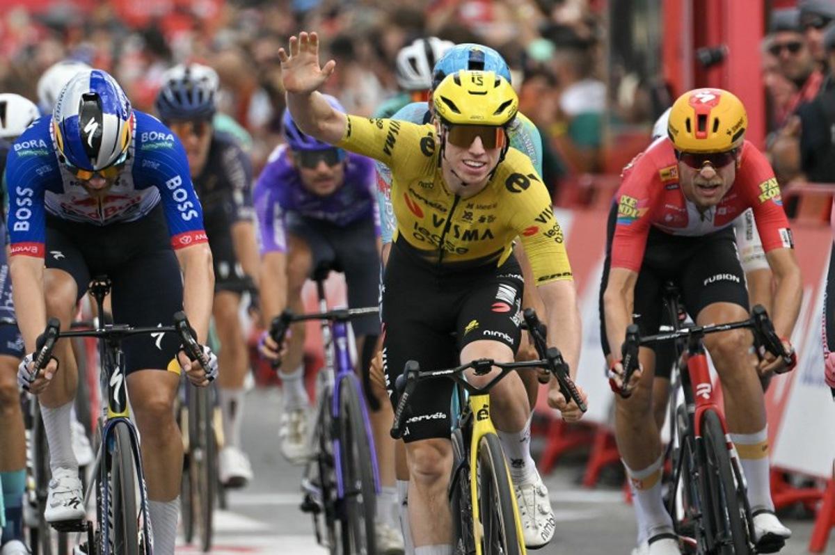 Team Visma-Lease a bike's British rider Matthew Brennan celebrates winning the 17th stage of the Vuelta a Espana 2026 cycling tour, a 185 km race between Dos Hermanas and Seville, on September 9, 2026.   JORGE GUERRERO / AFP