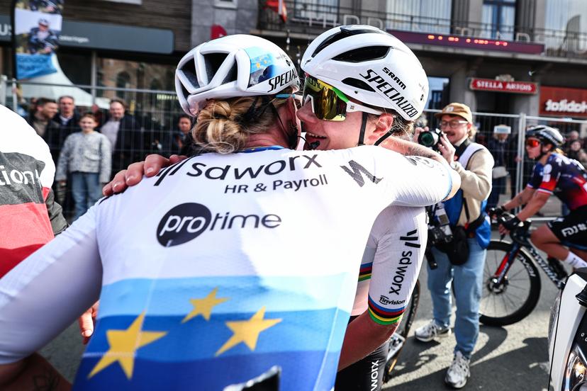 Belgian Lotte Kopecky of SD Worx-Protime and Dutch Lorena Wiebes of SD Worx-Protime celebrate after winning the women elite 'Gent-Wevelgem - In Flanders Fields' one day cycling race, 169.1 km from Ieper to Wevelgem, Sunday 30 March 2025. BELGA PHOTO DAVID PINTENS