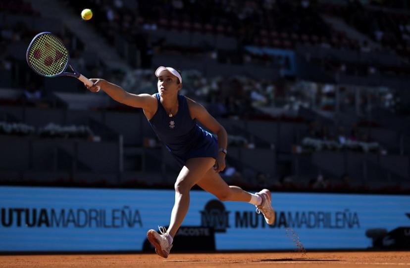 Belgium's Elise Mertens returns the ball to Belarus' Aryna Sabalenka during their 2025 WTA Tour Madrid Open tennis tournament third round singles match at the Caja Magica in Madrid, on April 27, 2025.   Thomas COEX / AFP
