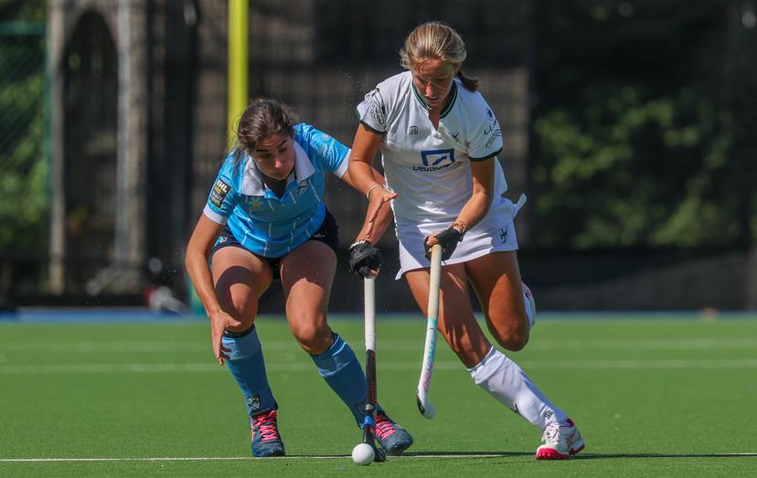 Braxgata's Lore Hillewaert and Watduck's Agathe Favart fight for the ball during a hockey game between Braxgata and Waterloo Ducks, Saturday 06 September 2025 in Boom, on day 1 of the Belgian Women Hockey League season 2025-2026. BELGA PHOTO VIRGINIE LEFOUR