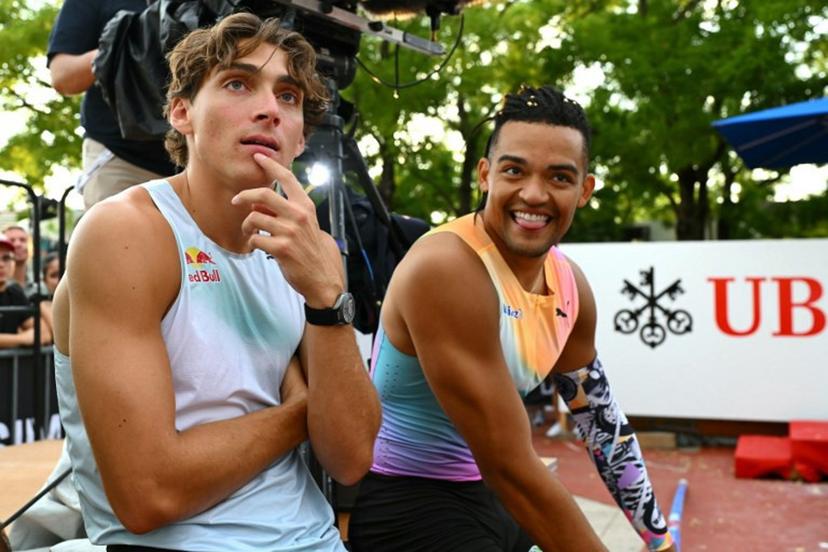Sweden's Armand Duplantis and Greece's Emmanouil Karalis react on the sidelines as they compete in the men's Pole Vault during the World Athletics Diamond League athletics meeting at the Stade Olympique de la Pontaise in Lausanne, on August 20, 2026.  Fabrice COFFRINI / AFP