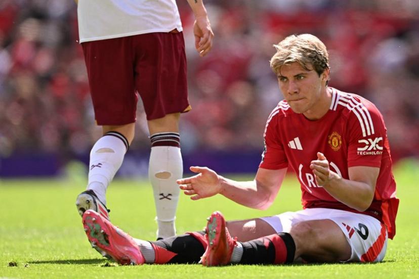 Manchester United's Danish striker #09 Rasmus Hojlund reacts to a missed chance during the English Premier League football match between Manchester United and West Ham United at Old Trafford in Manchester, north west England, on May 11, 2025.  Oli SCARFF / AFP