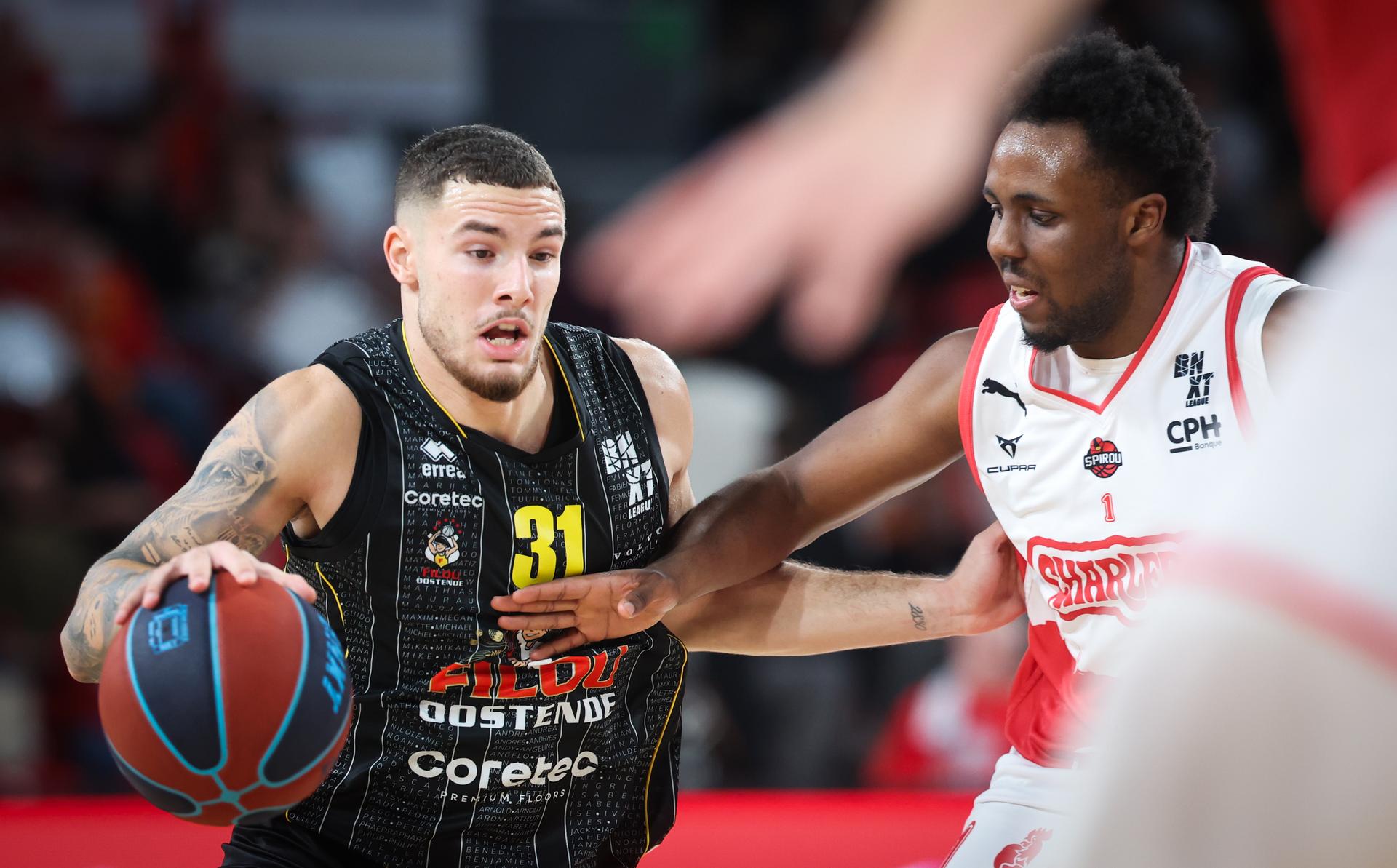 Oostende's Noam Yaacov and Spirou's Malcom Makwa fight for the ball during a basketball match between Spirou Charleroi and BC Oostende, Friday 17 October 2025 in Charleroi, on day 4 of the 'BNXT League' Belgian/ Dutch first division basket championship. BELGA PHOTO VIRGINIE LEFOUR