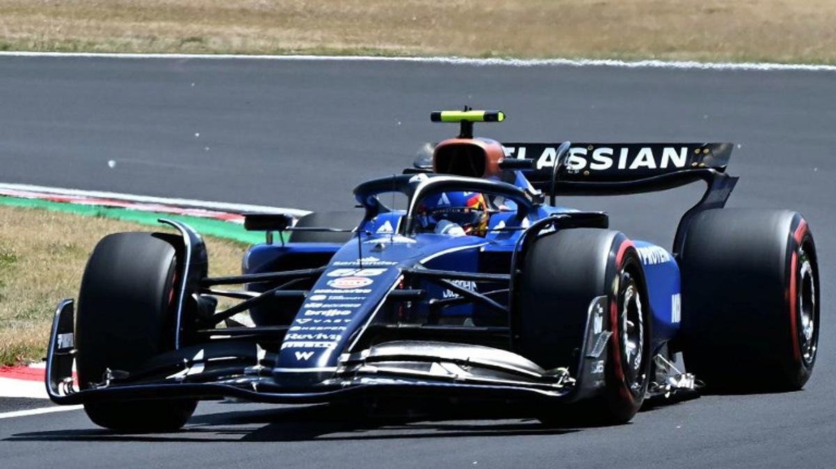 Williams' Spanish driver Carlos Sainz drives during the first practice session of the Formula One Japanese Grand Prix at the Suzuka circuit in Suzuka, Mie prefecture on April 4, 2025.  MOHD RASFAN / AFP