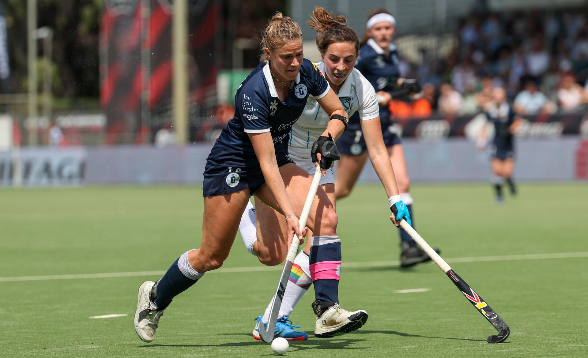 Gantoise's Alix Gerniers and Braxgata's Lore Hillewaert fight for the ball during a hockey game between Gantoise and Braxgata, Sunday 12 May 2024 in Antwerp, the return leg of the finals of the playoffs in the Belgian Hockey League women during the 2023-2024 season. BELGA PHOTO VIRGINIE LEFOUR