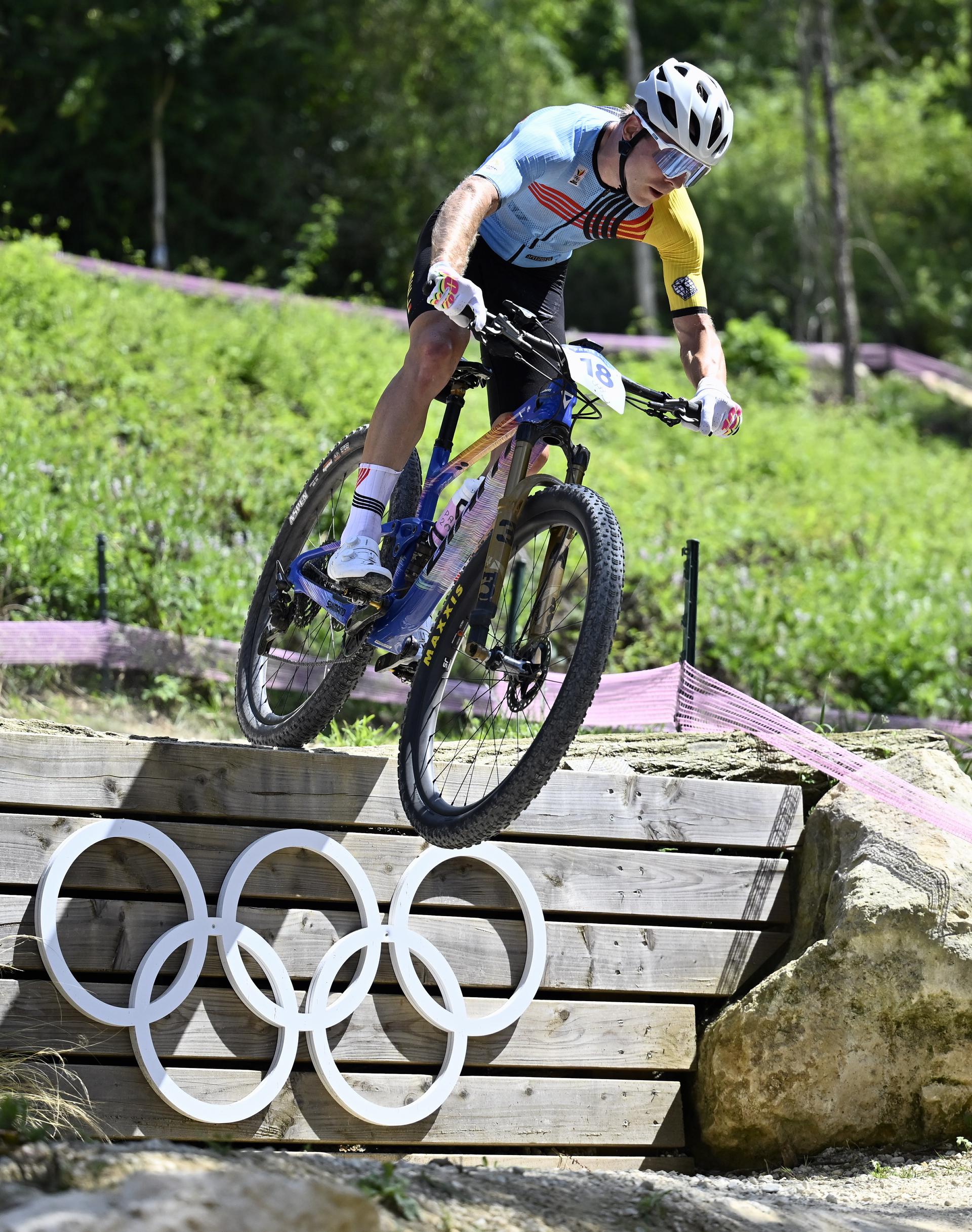 Belgian Jens Schuermans pictured in action during the men's cross-country mountain bike cycling race at the Paris 2024 Olympic Games, at the Colline d'Elancourt climb near Paris, France on Monday 29 July 2024. The Games of the XXXIII Olympiad are taking place in Paris from 26 July to 11 August. The Belgian delegation counts 165 athletes competing in 21 sports. BELGA PHOTO DIRK WAEM