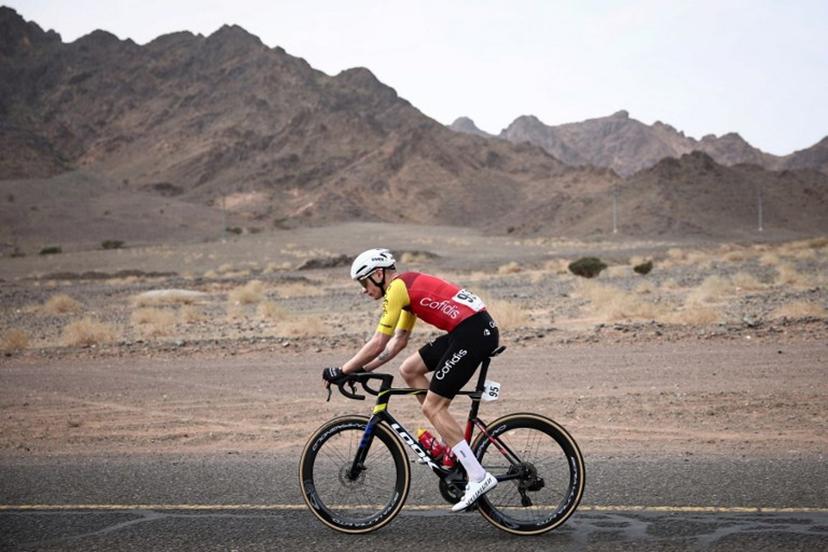 Cofidis cycling team's French Hugo Page rides during the first stage of the AlUla Tour cycling race, a 158 km race started and finished in the Saudi desert city of AlUla, on January 27, 2026.  Anne-Christine POUJOULAT / AFP