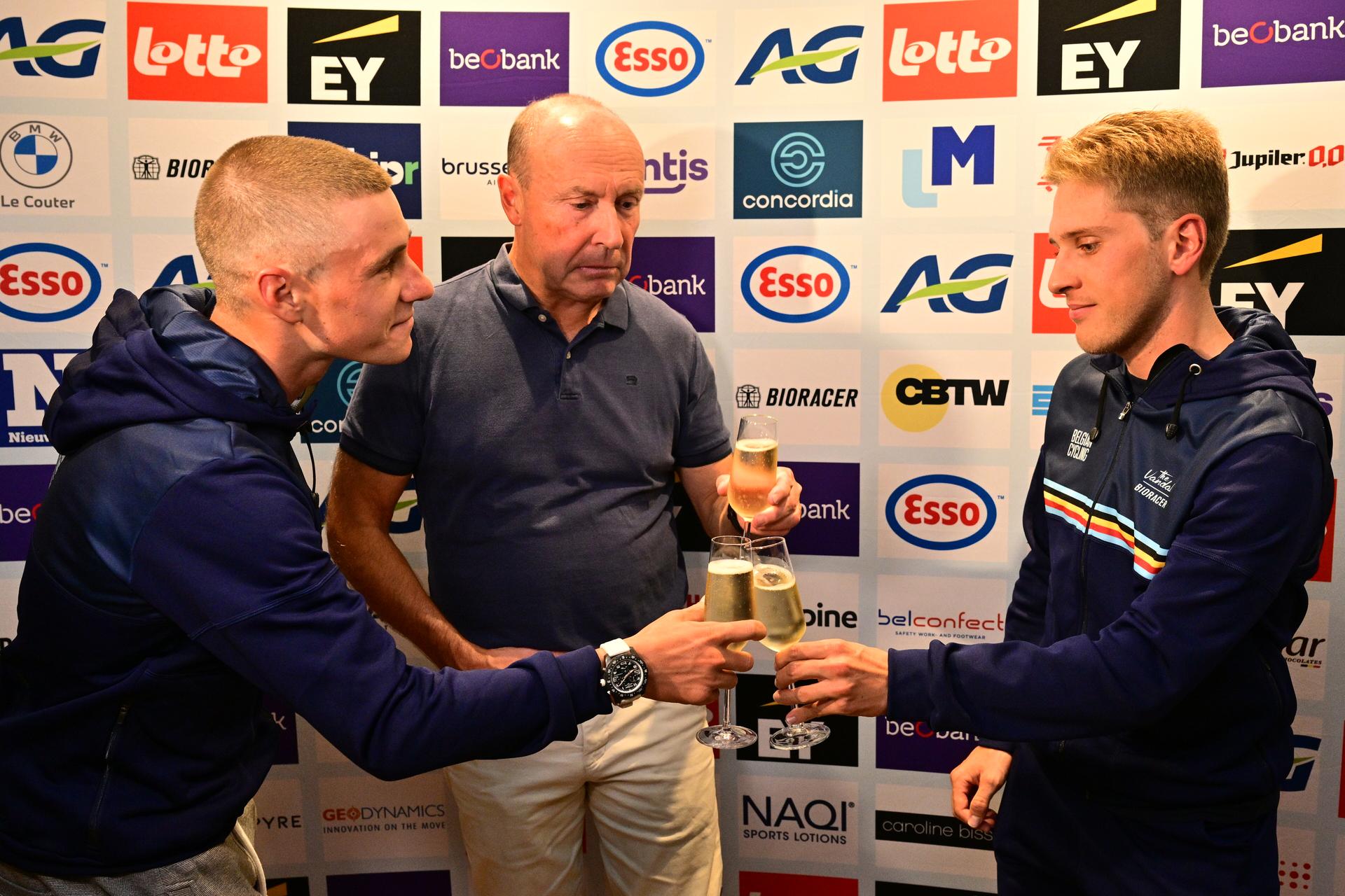 World champion Belgian Remco Evenepoel, Belgian Cycling Federation chairman Tom Van Damme and bronze medalist Belgian Ilan van Wilder celebrate with a glass of champagne at the hotel of Belgian team after the podium of Evenepoel and Van Wilder earlier today at the Men Elite Individual Time Trial race (40,8km) at the cycling road world championships, in Kigali, Rwanda, Sunday 21 September 2025. The 2025 UCI Road World Championships take place from 21 to 28 September in Kigali, Rwanda. BELGA PHOTO DIRK WAEM
