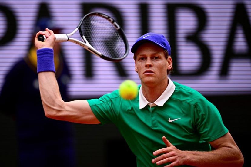 Italy's Jannik Sinner plays a forehand return to Kazakhstan's Alexander Bublik during their quarter-final men's singles match on day 11 of the French Open tennis tournament on Court Philippe-Chatrier at the Roland-Garros Complex in Paris on June 4, 2025.  JULIEN DE ROSA / AFP