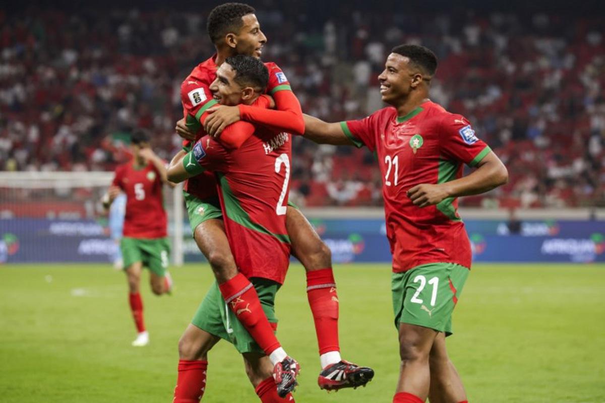 Morocco's midfielder Azzedine Ounahi celebrates scoring with teammates during the FIFA World Cup 2026 Group E African qualification football match between Morocco and Niger at the Prince Moulay Abdellah Sports Complex in Rabat on September 5, 2025.  Abdel Majid BZIOUAT / AFP